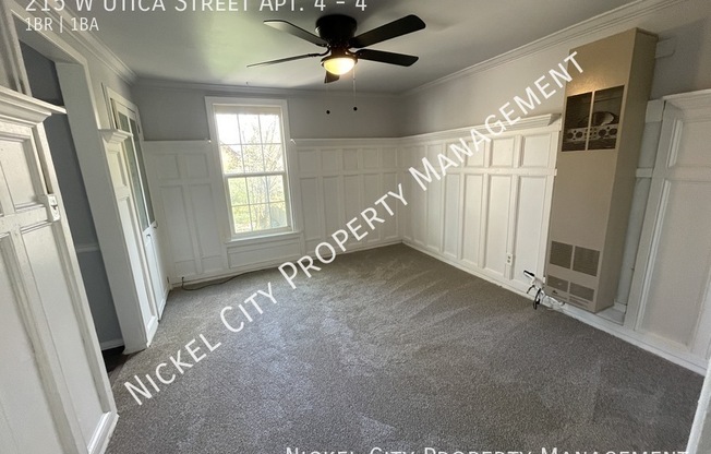 215 W UTICA ST