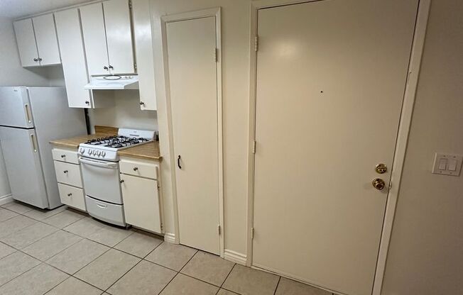 Upstairs 2BD/1BA Condo with 1 reserved covered parking, HOA pool, new paint, new flooring, in Lakeside.