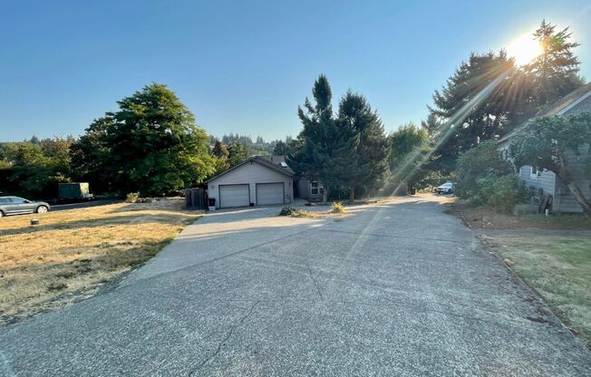 Don't Miss This West Linn Beauty! Formal Living Room~ Entertainer's Kitchen~ Double Fireplace~ Large Deck with Two Sliders~ Two Car Garage~ Large Fenced yard and MUCH MORE!