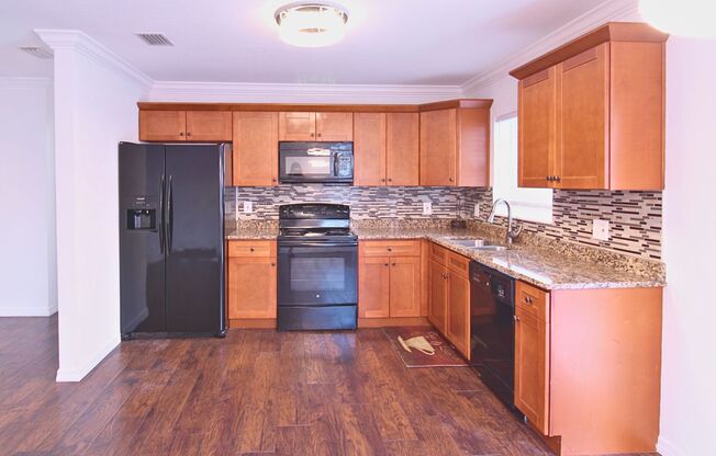 Charming Renovated Tampa Home with Fully Fenced Front & Backyard