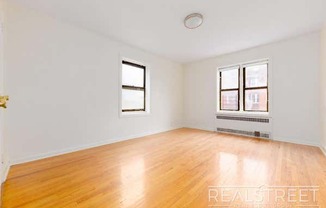 100 E 21