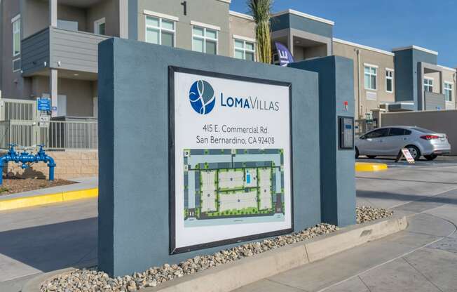 an image of a sign with a building in the background at Loma Villas Apartments, San Bernardino, 92408