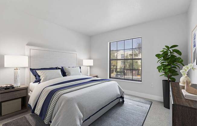 A bedroom with a large bed and a window with a view of a building.