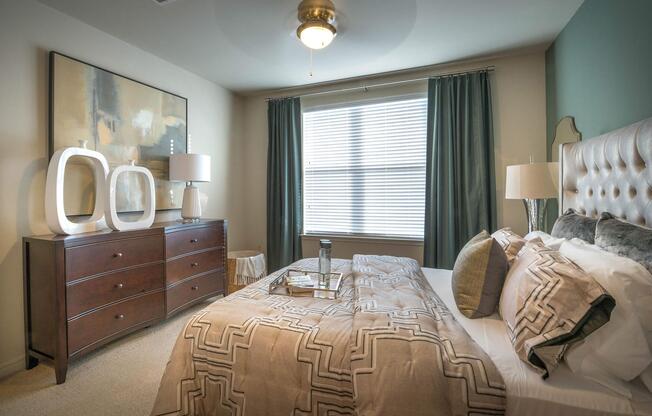a bedroom with a large bed in a hotel room