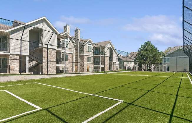 Community Soccer Field with Nets at Broadmoor Village Apartments located in West Jordan, UT.