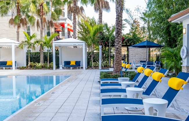 Poolside Seating at Aerial Pool and Clubhouse View at Sancerre at Sand Lake Apartments