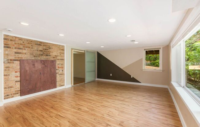 Completely Remodeled Kenmore Home with Two-Car attached Garage and Fenced Backyard!