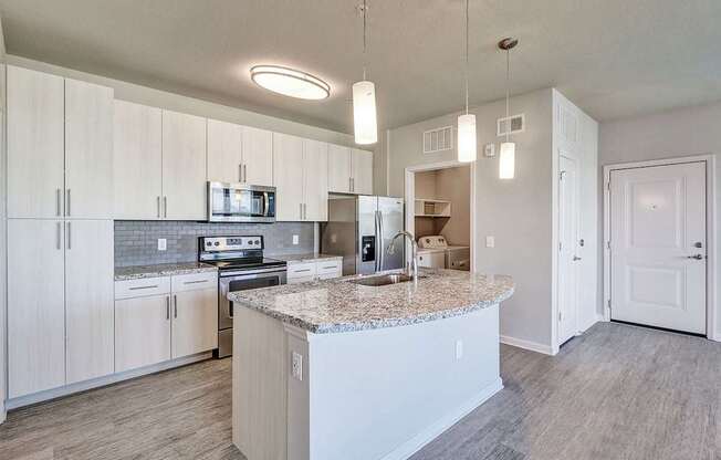 Phase II units include granite countertops and hardwood-inspired flooring throughout