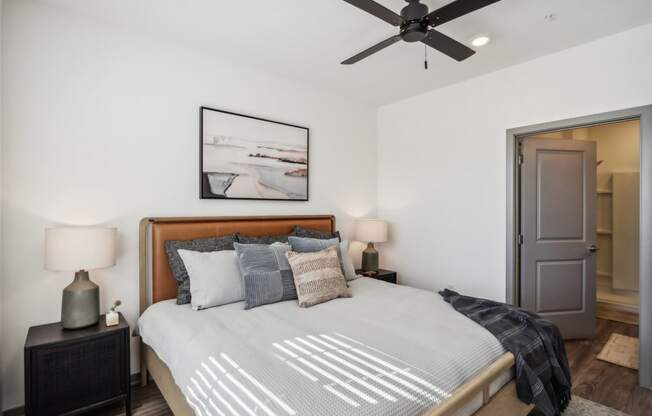 a bedroom with a large bed and a ceiling fan at Stella, San Tan Valley Arizona