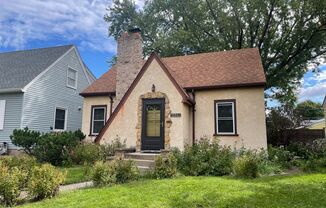 The Cutest 3-Bedroom Tudor - One Block From Como Golf Course