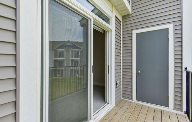 Slider to Balcony with Enclosed Storage at Chase Creek Apartment Homes, Huntsville, AL, 35811