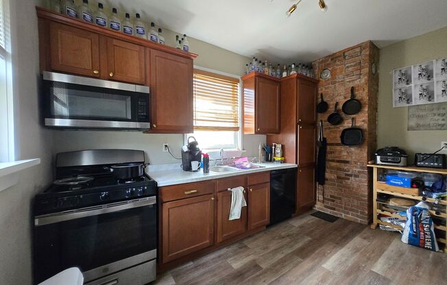 Large 5 Bedroom 2 Bath Single Family Home! Off Street Parking - On Site Laundry!