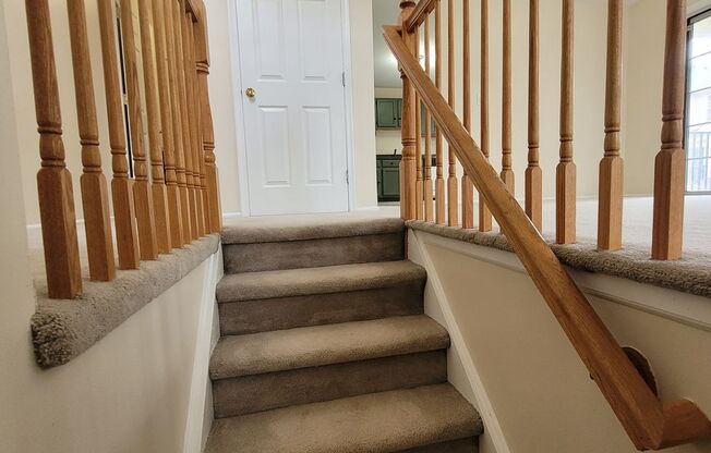 Spacious, freshly painted with lots of amenities describes this centrally located, tri-level townhouse!
