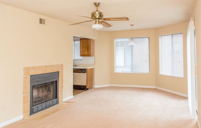 Living room with ceiling fan at Laurel Grove Apartment Homes, Orange Park, FL