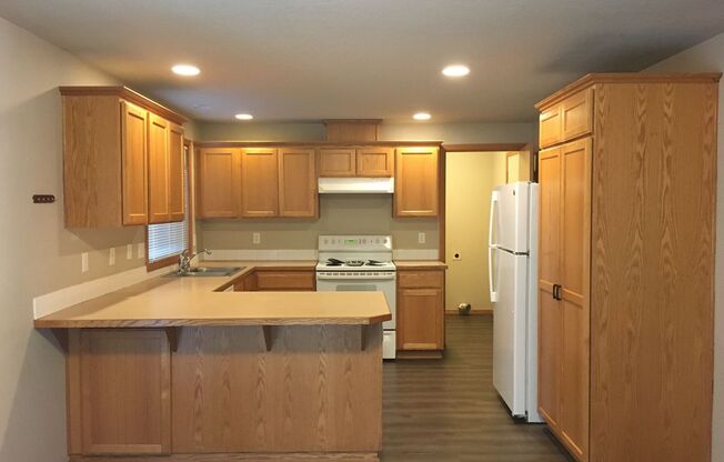 Spacious 4-Bedroom Home with Classic Charm & Tranquil Patio Retreat
