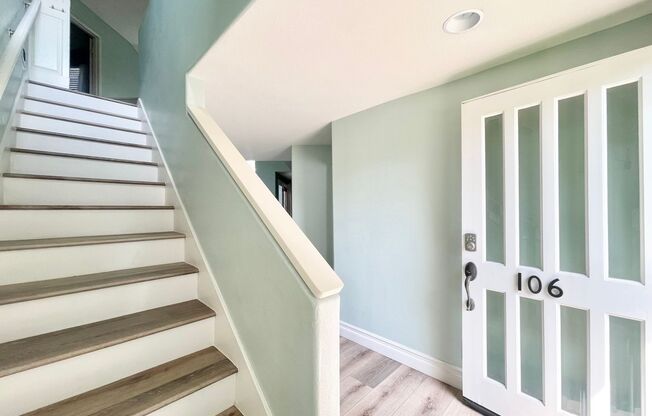 Beautifully Updated two-story 3 bed 3.5 Bath Condo Embodies Coastal Living