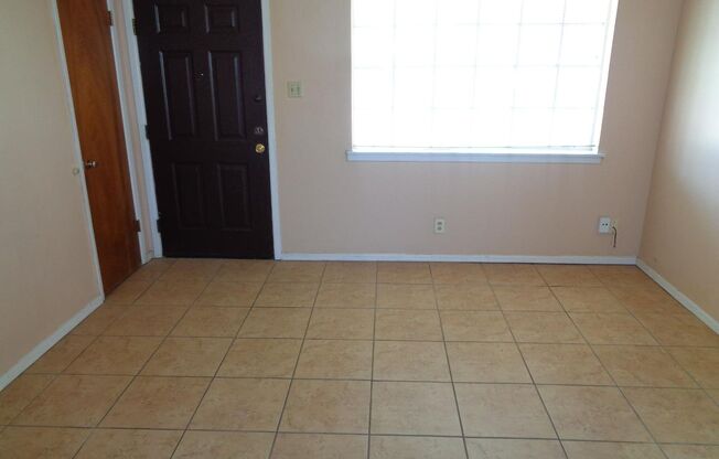 Cute Single Level Northeast Home With Refrigerated Air Located In Quiet Neighborhood