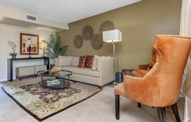 a living room filled with furniture and a fire place