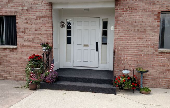 August Management presents the Colonial Apartments in New Holstein