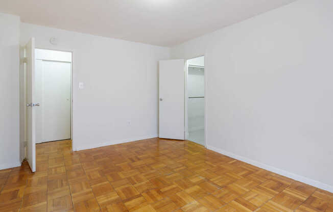 Bedroom with Parquet Flooring