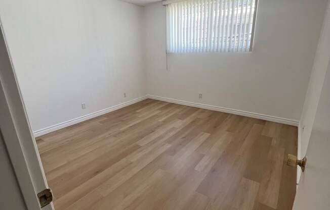 Bedroom with Hardwood Floors