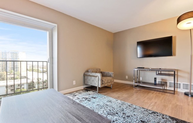 Renovated Living room with balcony sliding door, wood-style floorings