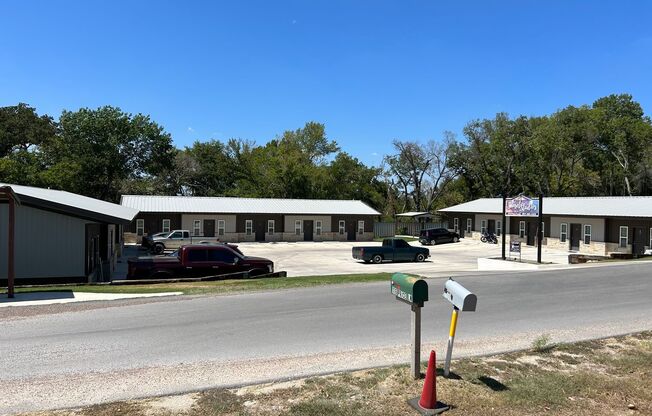 FOR LEASE - Nice 1 BR – 1 BA Unit With Stained Concrete Floors, Refrigerator, Microwave & Range. Water, Sewer, Dumpster, Lawn Care & Basic Wi-Fi Included.