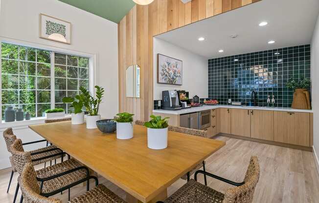 clubroom with dining table and coffee station