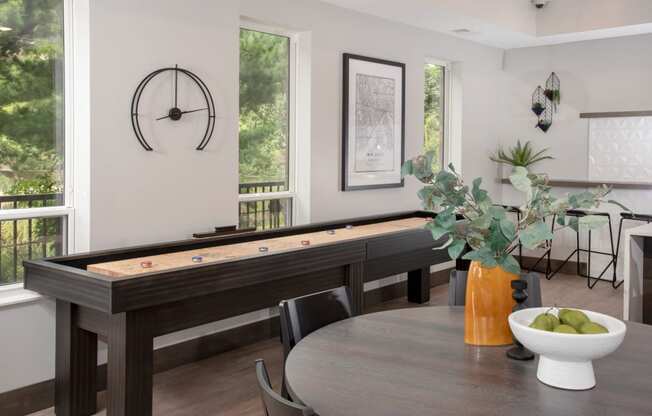 Shuffleboard table in community room at UPII at Urban Park I and II Apartments, St Louis Park, Minnesota