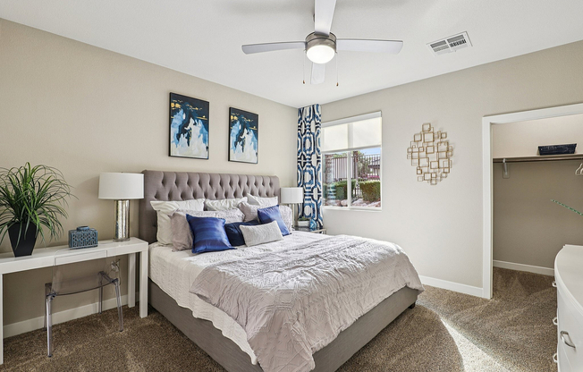 Carpeted Bedroom with Walk In Closet