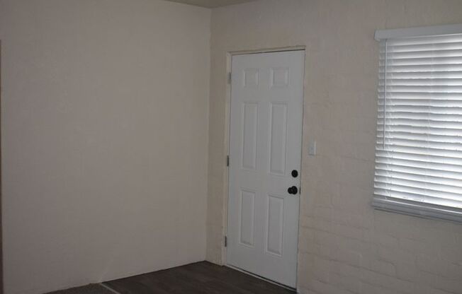 Darling Two Bedroom Home with all New Carpet/ Paint/ Dual Pane Windows/ Garage