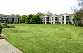 Rolling Green Lawns with Mature Shade Trees at Emerald Park Apartments, MI 49001