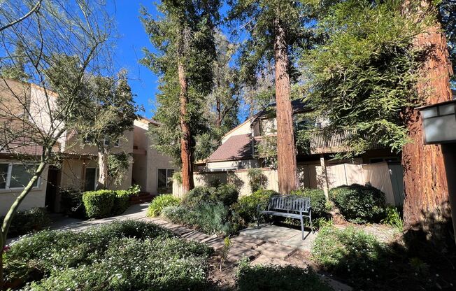 LOCATION! Move-in ready 2+2 w/parking, pool + balcony!