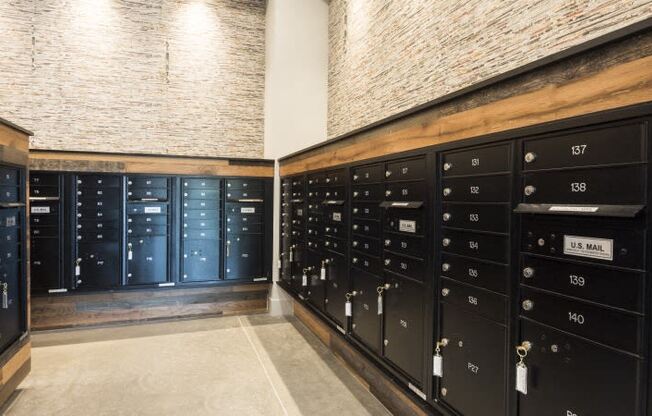 the lockers in the basement of the building are lined up against a wall with