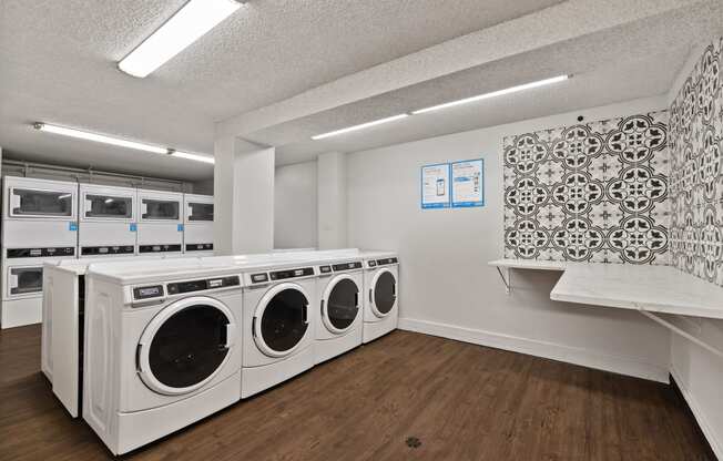 Laundry room with many machines. at Talavera, Idaho