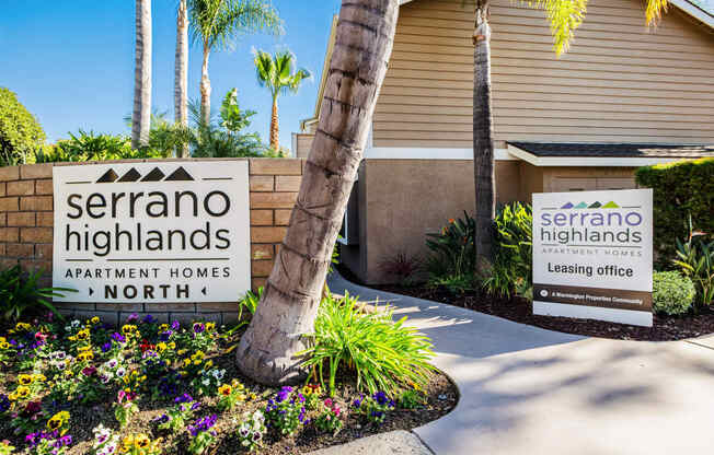 a building with a sign highlands apartment homes in north