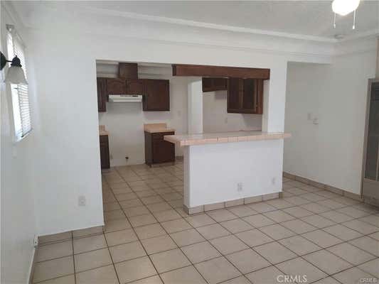 1305 W 56 ST