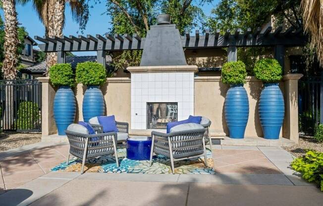 Firepit with surrounding seating - Lunaire Apartments | Goodyear, Arizona