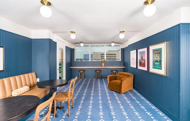 Colorful and inviting, the lounge at Modera St. Paul offers stylish seating and vibrant design, perfect for casual gatherings in downtown Dallas.