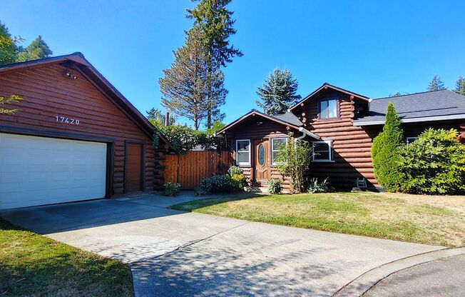 Amazing Log Cabin on a Large Corner Lot with Oversized 2 Car Garage!