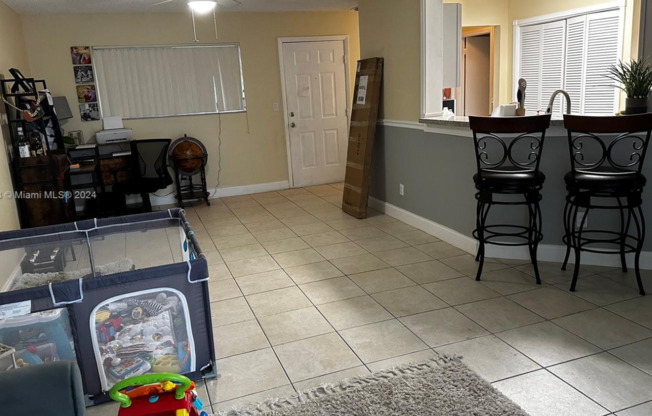 2-bedroom, 2-bathroom condo in a well-maintained gated community, featuring a spectacular direct lake view