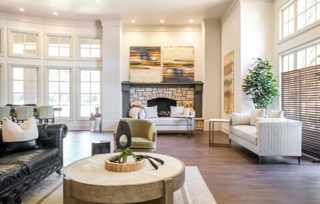 social lounge with fireside conversation areas at Stoneleigh on Spring Creek apartments