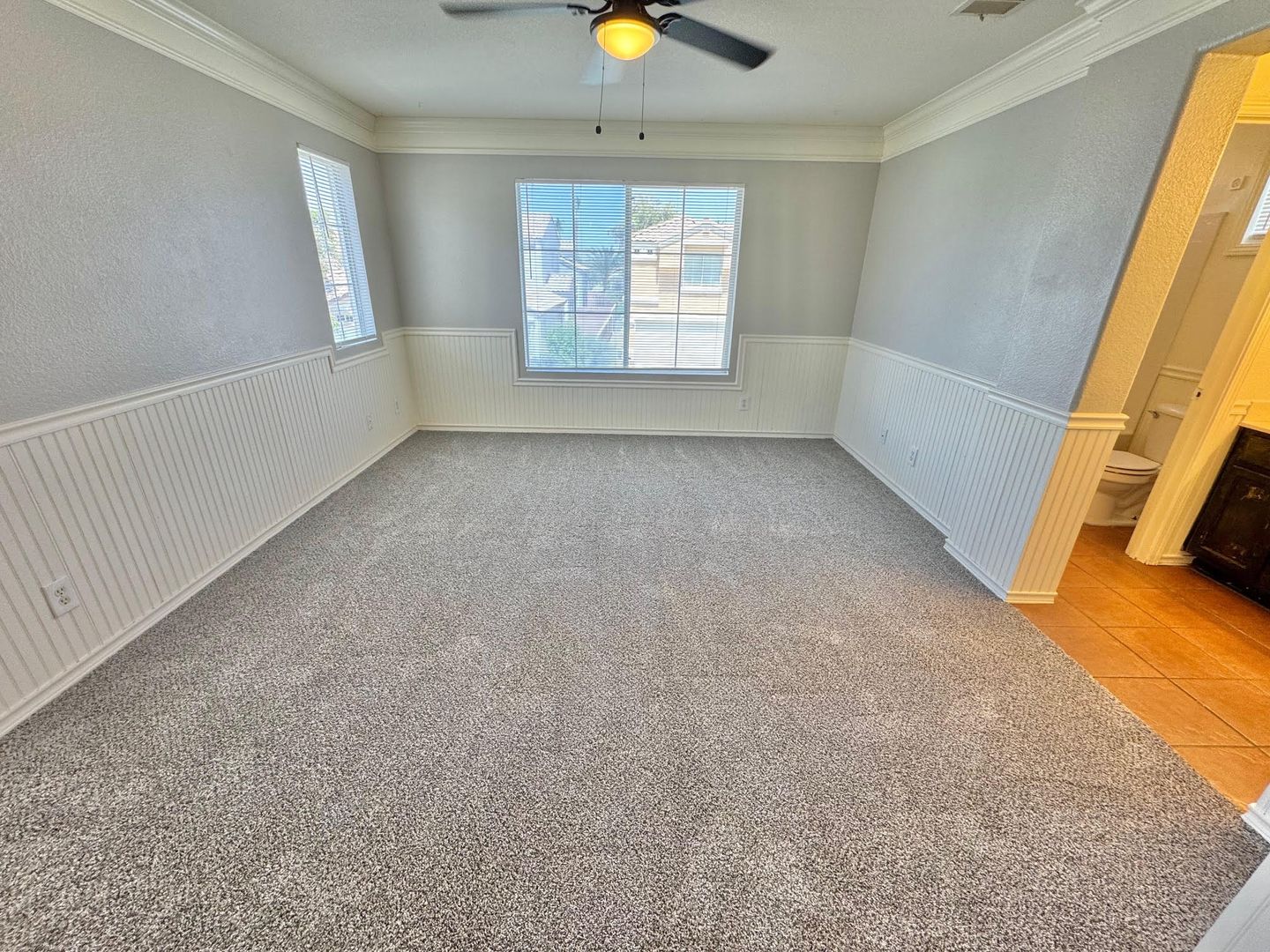 THIS IS A CHARMING TWO-STORY NORTH LAS VEGAS HOME WITH 2 BEDROOMS, 2.5 BATHS AND A TWO-CAR ATTACHED GARAGE. FEATURING TILE AND CARPET FLOORING, NEUTRAL PAINT, AND BLINDS THROUGHOUT, THE MAIN LEVEL OFFERS AN OPEN LIVING AND DINING AREA THAT FLOWS INTO A KI