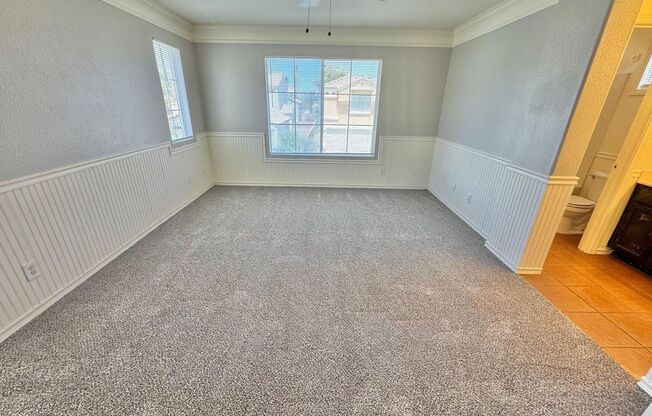 THIS IS A CHARMING TWO-STORY NORTH LAS VEGAS HOME WITH 2 BEDROOMS, 2.5 BATHS AND A TWO-CAR ATTACHED GARAGE. FEATURING TILE AND CARPET FLOORING, NEUTRAL PAINT, AND BLINDS THROUGHOUT, THE MAIN LEVEL OFFERS AN OPEN LIVING AND DINING AREA THAT FLOWS INTO A KI