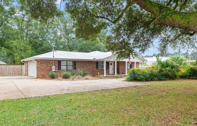 Gorgeous 4/2 Renovated Home in the Heart of Pace!!