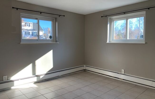 Heat and hot water included! Bright and clean 2 bed 1 bath 1st floor condo in a well managed building