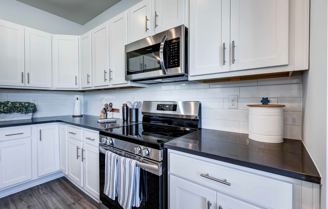 Experience the perfect blend of charm and technology in your cottage’s beautiful kitchen, equipped with smart home features, including convenient USB outlets.