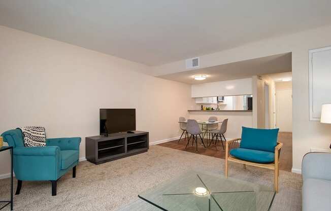 TV, Sofa In Living Room at Wilbur Oaks Apartments, Thousand Oaks, 91360