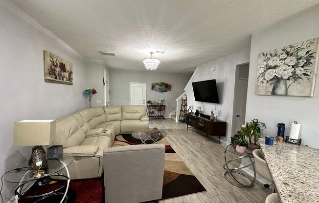 Lease this 3BR End-Unit Townhome in Gated Community with Water View!