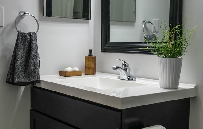 Bathroom with mirror at Bloomfield Apartments, Dayton, Ohio